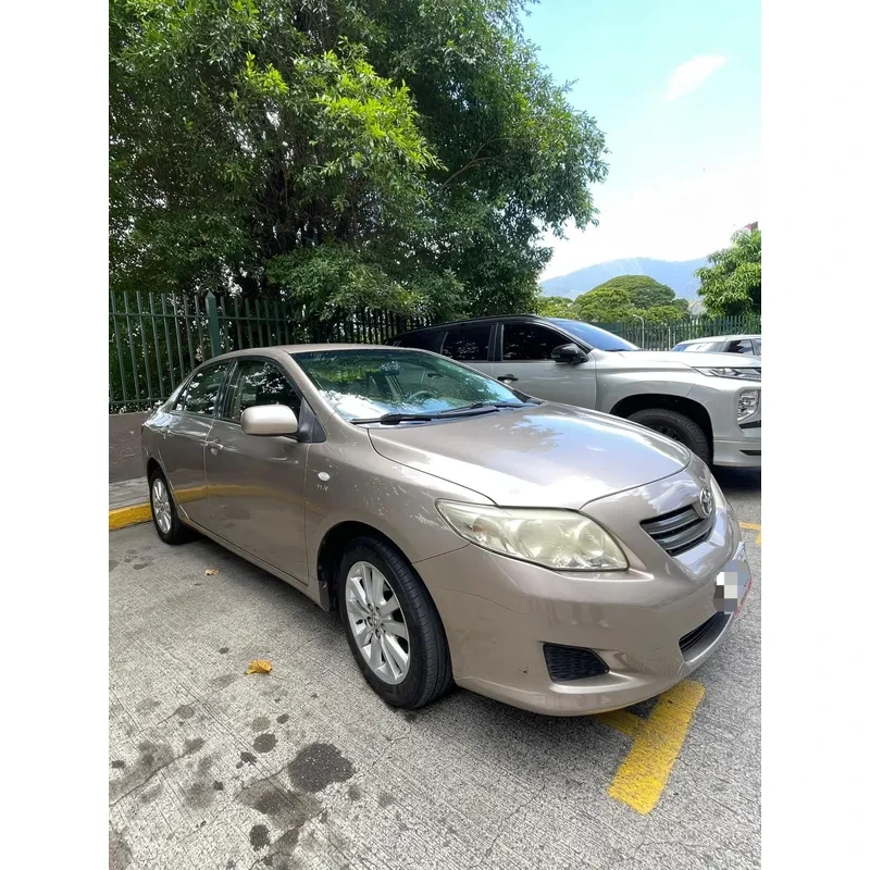 Vista 10 del vehículo: Toyota Corolla Xei Con Sistema De Gas